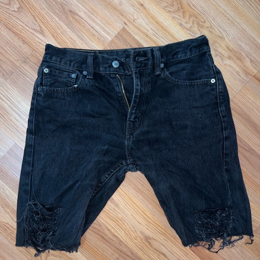 Black Levi’s Distressed Denim Cutoff Shorts